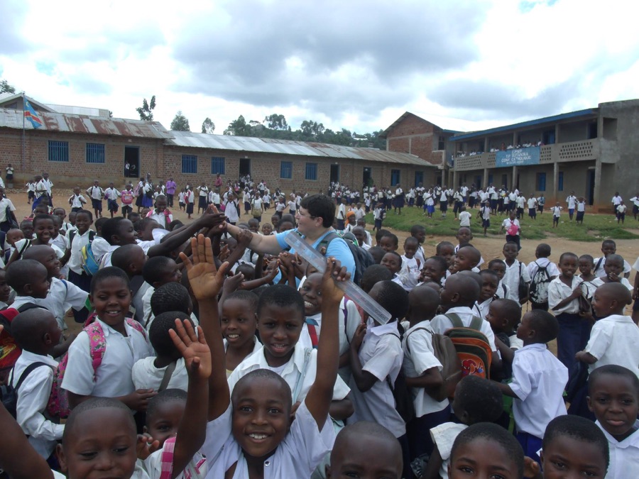 Students crowd a school courtyard in the Congo.